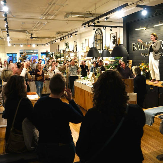 Owner of Bailey Road toasting to a community of supporters, clients, and friends on the re-opening of the store.
