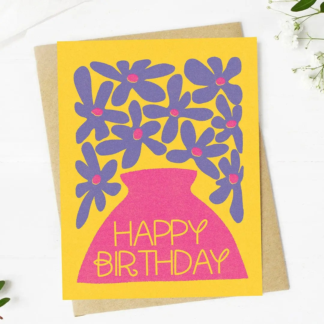 Purple Flowers in Pink Vase Birthday Greeting Card